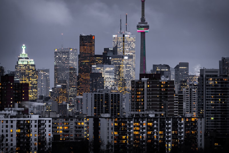 City skyline with contemporary glass towers at dusk